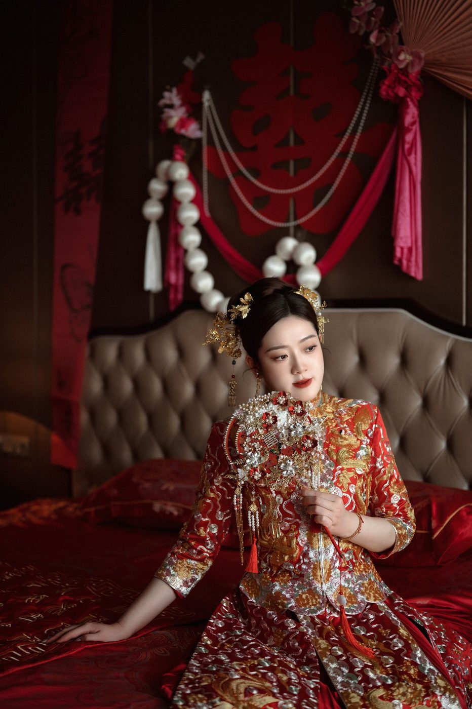 Bride in a red and gold Chinese wedding dress