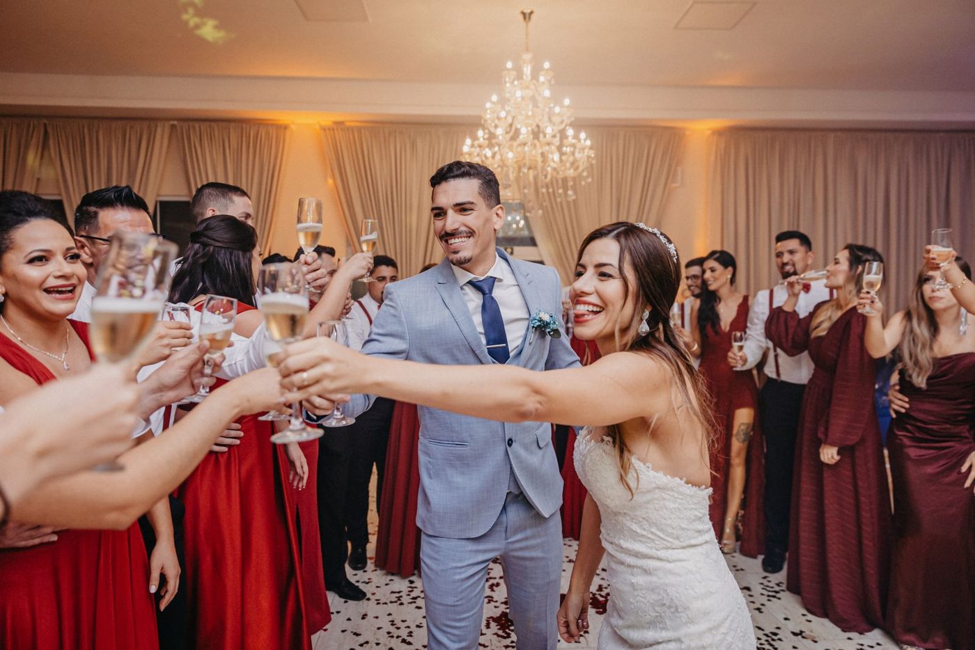 Friends toasting champagne together at a wedding