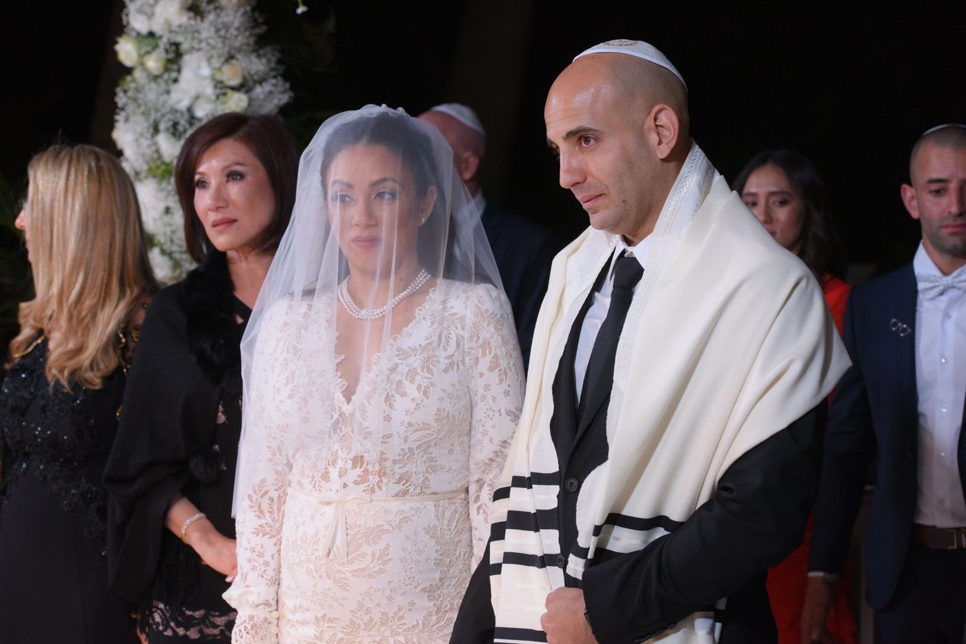 Jewish bride and groom under the Chuppah